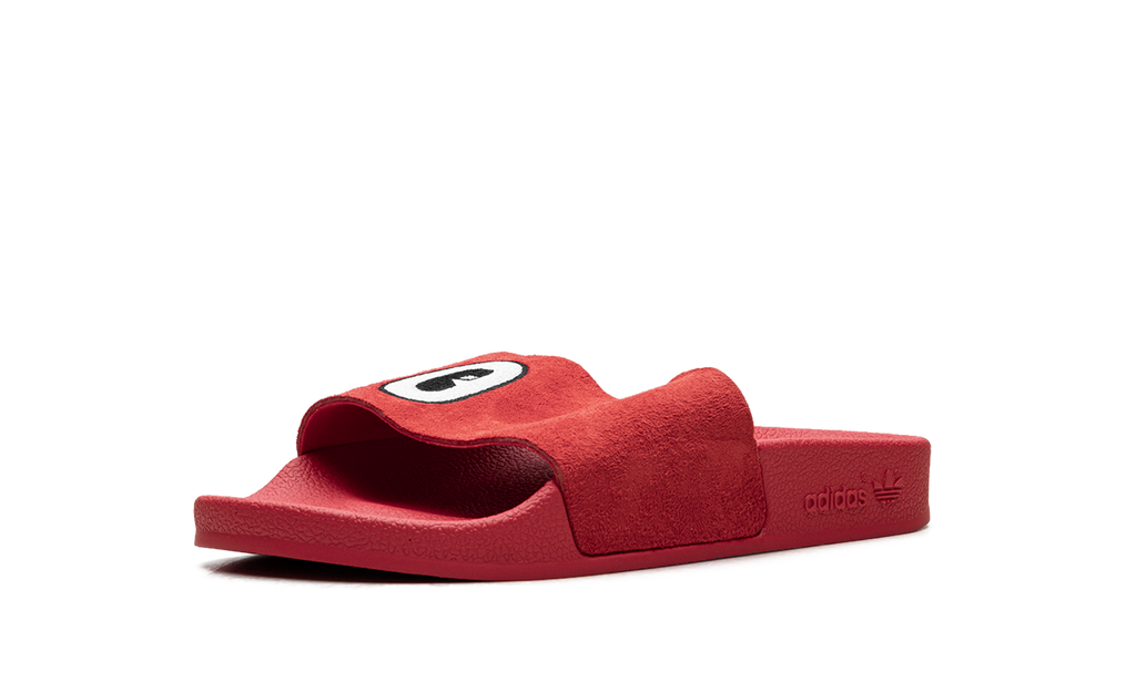 Adilette Suede Slide WMNS "Cartoon Eye" CM8412